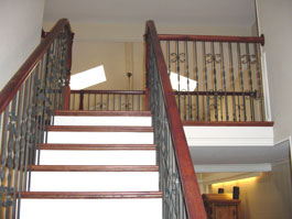 Photograph of circular wood staircase from starter step